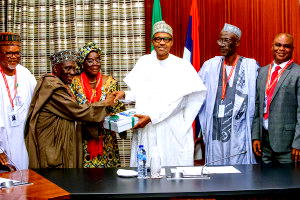PHOTOS: President Buhari receives Annual Report of Police Service Commission in State House