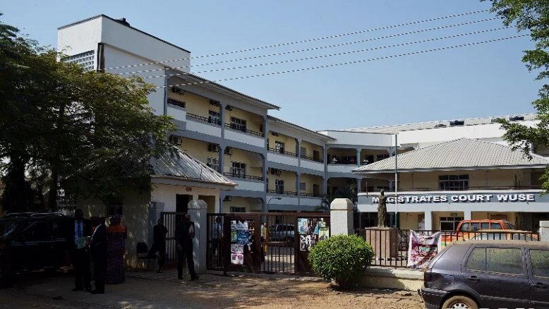 Banker docked for defamation