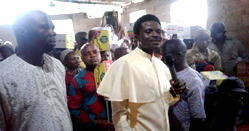 Pentecostal pastor fetes the blind, the crippled, widows in church