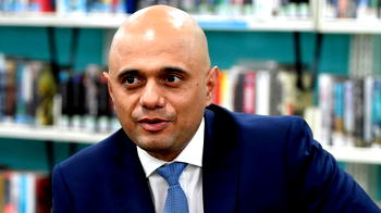 Britain’s plan to raise minimum wage backed by review