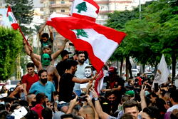 Lebanese army urges protesters to open roads after Hariri’s resignation