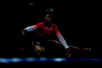 Simone Biles wins 15th world title as US claim team gold