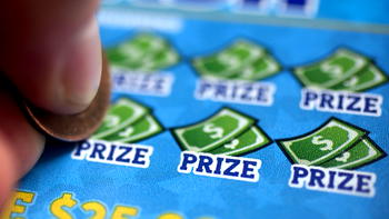 Cancer patient wins $200,000 lottery prize on way to last chemotherapy treatment