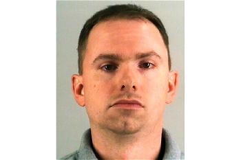US officer charged with murder of black woman, resigns after shooting