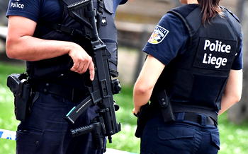 Police find 12 migrants alive in refrigerated truck in Belgium