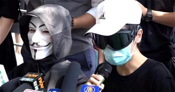 Hong Kong considers banning face masks in bid to deter protests