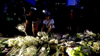 Thousands gather for ‘martyrs’ vigil amid Hong Kong protests