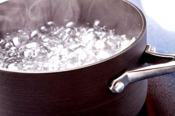 Housewife docked for allegedly pouring hot water on husband’s ex-wife