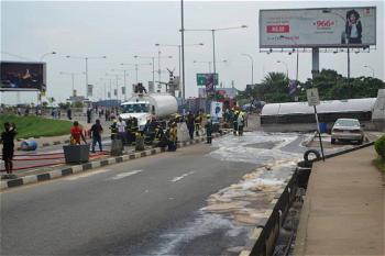 PHOTOS: Fallen fuel tanker spills content along MM2 Road as gridlock builds 