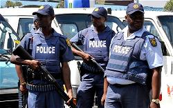 Eight South African police officers charged with murder of Nigerian