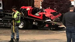 Speeding Porsche crashes into second storey after losing control