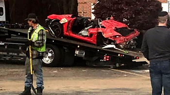 Speeding Porsche crashes into second storey after losing control