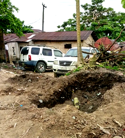 Village Head allegedly jumps into grave, stops children from burying parents