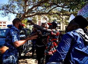 Busted: Those responsible for the attack on protesters unmasked