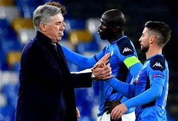 Ancelotti defiant as Napoli advance in Champions League