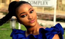 Etinosa: Outrage as actress uses bible as ashtray, threatens Quran next