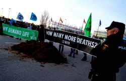 Climate Change: Frustrated activists dump manure outside Madrid summit
