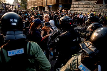 Hong Kong marks Christmas Eve with clashes, tear gas