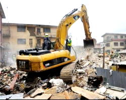 Lagos govt demolishes two distressed buildings in Island