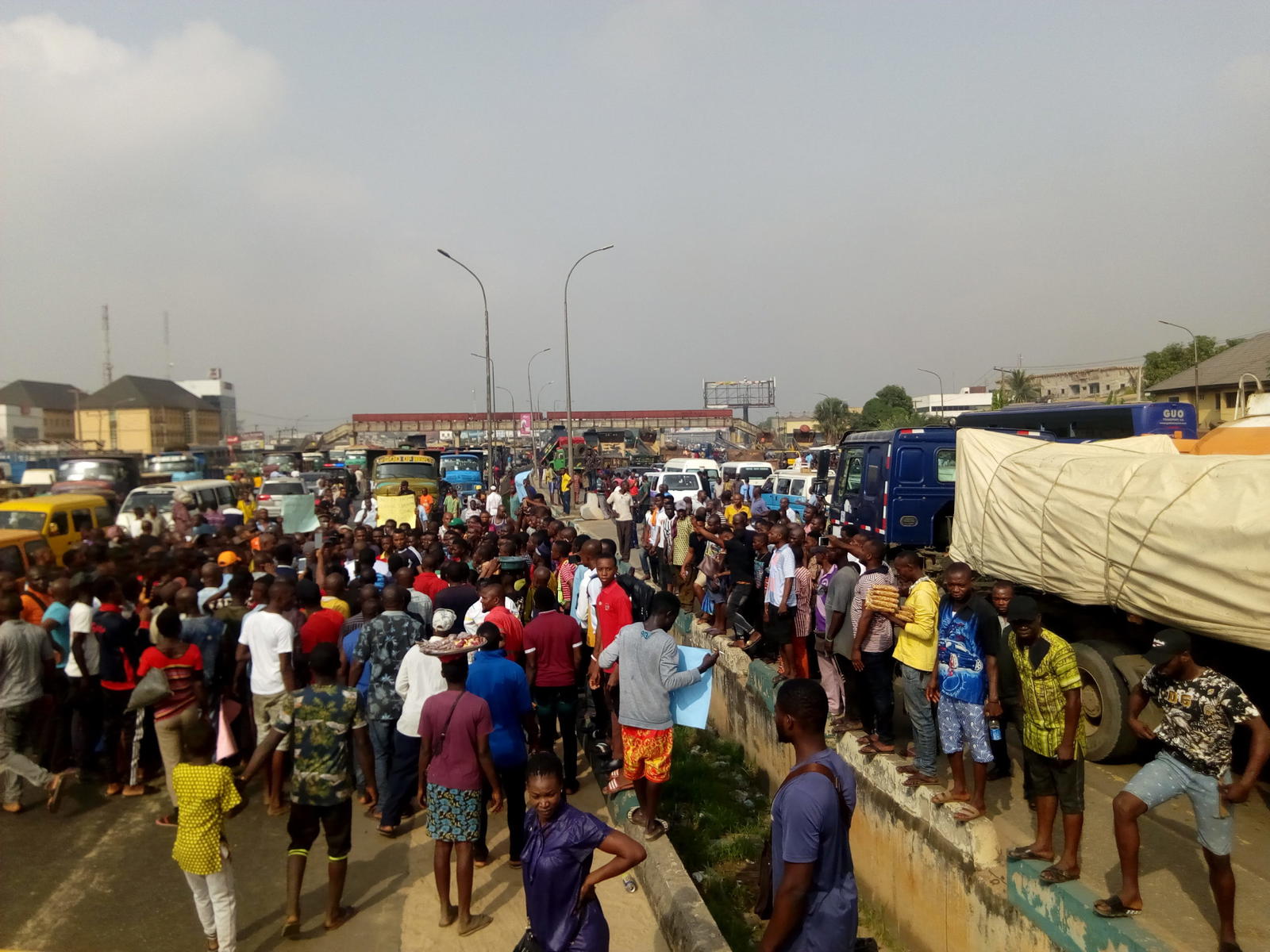 Protest In Onitsha As Tipper Drivers Block Onitsha Enugu Expressway 2436