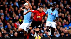 Manchester giants seek derby delight as Liverpool threaten to burst beyond reach