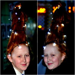 Christmas: Girl storms school with Christmas tree-like hair-do