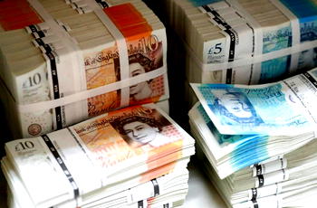Sterling slides on eve of UK election