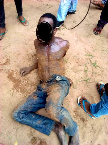 Man caught raping little girl inside bush in Abia (photos)