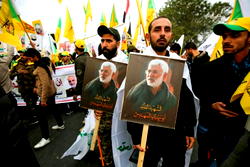 Thousands mourn slain Iranian commander