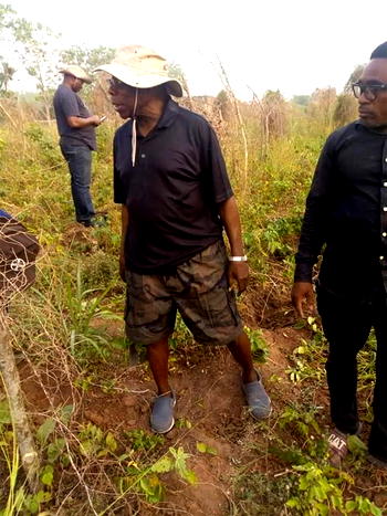 PHOTOS: Obasanjo enters farm, harvests yam in Ogun