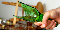 Woman allegedly threatens landlady with broken bottle