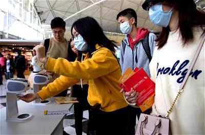 China firm develops system to recognize faces behind coronavirus masks