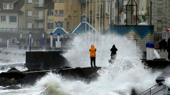 Storm wreaks havoc across France, Britain