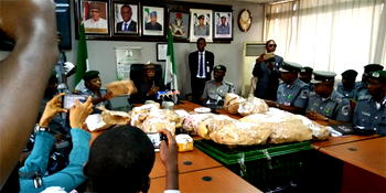 Breaking: Customs storms Lagos airport, arrests passenger with $8.6m