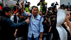 Outspoken Hong Kong publisher held over pro-democracy march