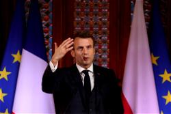 France’s Macron seeks to calm tensions with Muslims