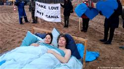 Poland: Naked couple protests in bed against canal project on Valentine’s Day