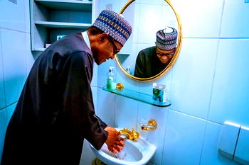 Coronavirus: President Buhari shows how proper hand washing is done