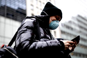 Experts say face masks can help slow COVID-19, despite previous claims