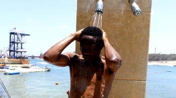 Eagles star Ahmed Musa swims with ‘dolphin’ to kill time