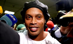 Prison warden says Ronaldinho adapting to jail with usual smile
