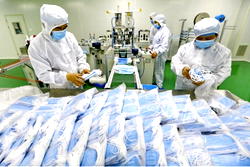 China says no plans to limit export of anti-virus supplies