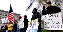 Americans in hundreds protest against virus rules amid spreading resentment