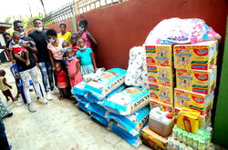 Comedian I Go Dye, Martins Efe donate palliative materials to Motherless Homes