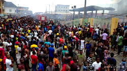 PHOTOS: Lagosians defy social distancing order as fire guts NNPC station in Ogba