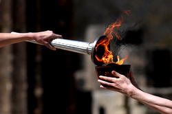 Japan ends Olympic flame display due to virus