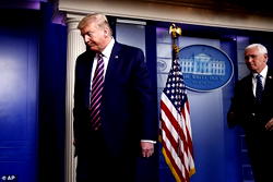 Trump leaves hospital for White House; removes mask immediately