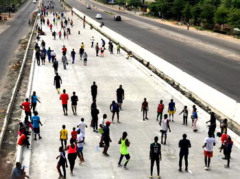 Social distancing: Lagosians on Gbagada expressway keeping fit amidst lockdown