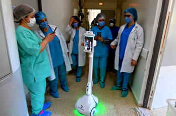 Robot helps Tunisia medics avoid infection from coronavirus patients