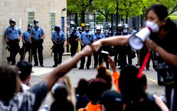 Mayor of Minneapolis calls for criminal charges against officer who put knee on man’s neck